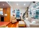 Living room with a view to the kitchen with hardwood floors and natural light at 2169 Westrivers Rd, Charleston, SC 29412