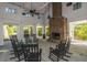 Inviting community room with a brick fireplace and comfortable rocking chairs at 225 River Oak Dr, Mount Pleasant, SC 29464