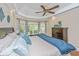 Spacious main bedroom featuring a bay window, tray ceiling and ceiling fan at 225 River Oak Dr, Mount Pleasant, SC 29464
