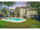 Private backyard pool featuring lush landscaping and architectural details, perfect for relaxation at 225 River Oak Dr, Mount Pleasant, SC 29464