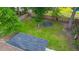 A high angle view of the house and yard with trees surrounding a trampoline at 2436 Stingray Blvd, North Charleston, SC 29406