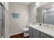 Updated bathroom with modern vanity, quartz countertops, and tiled shower at 2436 Stingray Blvd, North Charleston, SC 29406