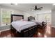 Bright bedroom featuring two beds, fan and windows at 2436 Stingray Blvd, North Charleston, SC 29406