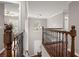 View of the hallway from the top of the stairs at 2436 Stingray Blvd, North Charleston, SC 29406