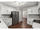 Kitchen showcases stainless steel appliances, white cabinetry, and modern backsplash at 2436 Stingray Blvd, North Charleston, SC 29406