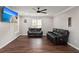 Comfortable living room features hardwood floors, neutral colors, and lots of space for entertaining or relaxation at 2436 Stingray Blvd, North Charleston, SC 29406
