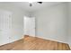 Bright bedroom features gleaming hardwood floors and neutral walls at 2520 Woodstream Rd, Mount Pleasant, SC 29466