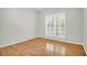 Inviting bedroom featuring hardwood floors and a light-filled window at 2520 Woodstream Rd, Mount Pleasant, SC 29466