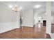 Dining room with wood floors, chandelier, and adjacent living spaces at 2520 Woodstream Rd, Mount Pleasant, SC 29466