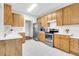 Well-lit kitchen featuring stainless steel appliances and abundant cabinet space at 2520 Woodstream Rd, Mount Pleasant, SC 29466
