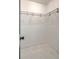 Walk-in closet with white walls, herringbone tile flooring, and wire shelving for optimal organization at 2534 Flamingo Dr, Charleston, SC 29414