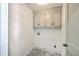 Laundry area featuring storage cabinets and gray marble flooring at 2534 Flamingo Dr, Charleston, SC 29414