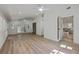 Spacious living room with hardwood floors, white walls, many windows and french doors with outdoor views at 2534 Flamingo Dr, Charleston, SC 29414