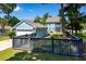 View of the backyard, garage, and fenced in yard; plenty of space for relaxing and enjoying the outdoors at 2627 Rutherford Way, Charleston, SC 29414