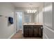 Bright bathroom with a double sink vanity, lots of counter space, and a view into the toilet and shower area at 2627 Rutherford Way, Charleston, SC 29414