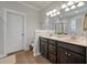 Bathroom with a double vanity, granite countertops, and a separate toilet and shower at 2627 Rutherford Way, Charleston, SC 29414