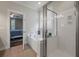 Bathroom featuring a tub, separate shower with glass doors, and a peek into the bedroom at 2627 Rutherford Way, Charleston, SC 29414