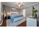 Bedroom featuring blue bedding, hardwood floors, and neutral walls with a ceiling fan at 2627 Rutherford Way, Charleston, SC 29414