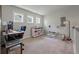 Upstairs bonus room with desk, play area and three windows for natural light at 2627 Rutherford Way, Charleston, SC 29414