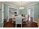 Charming dining area with a round table and elegant chairs, open to other living spaces in the home at 2627 Rutherford Way, Charleston, SC 29414
