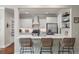 Beautiful kitchen with white cabinetry, stainless steel appliances, and a breakfast bar at 2627 Rutherford Way, Charleston, SC 29414