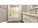 Clean bathroom features marble countertops, a shower/tub combination, and white vanity at 2636 Elissa Dr, Charleston, SC 29414