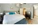 Comfortable main bedroom with ceiling fan, en-suite bathroom, and a decorative rug at 2636 Elissa Dr, Charleston, SC 29414