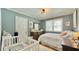 Charming Bedroom with wood floors, neutral paint, and crib at 2636 Elissa Dr, Charleston, SC 29414