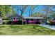 Charming brick home with colorful azalea bushes and a well-maintained lawn, perfect for curb appeal at 2636 Elissa Dr, Charleston, SC 29414