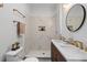 Modern bathroom featuring double sinks, new shower tiles, and elegant fixtures at 285 Roosevelt Dr, Saint Stephen, SC 29479