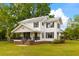 Charming two-story home with a welcoming front porch, and meticulously maintained front yard at 285 Roosevelt Dr, Saint Stephen, SC 29479