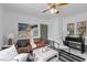 Comfortable living room with leather sofa, stylish chairs, and modern decor at 285 Roosevelt Dr, Saint Stephen, SC 29479