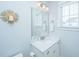 Bright bathroom featuring a vanity with a speckled countertop and ample natural light at 2962 Clearwater Dr, Mount Pleasant, SC 29466