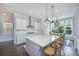 Modern kitchen with white cabinetry, stainless steel appliances, and a large island with seating at 2962 Clearwater Dr, Mount Pleasant, SC 29466