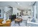 Inviting living area with hardwood floors, staircase, stylish furniture, and an open floor plan at 2962 Clearwater Dr, Mount Pleasant, SC 29466