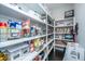 Organized pantry featuring ample shelving and storage baskets filled with a variety of food items at 2962 Clearwater Dr, Mount Pleasant, SC 29466