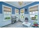 Bright playroom with blue wallpaper, white trim, and large windows offering natural light at 2962 Clearwater Dr, Mount Pleasant, SC 29466
