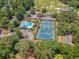 Aerial view showcasing tennis courts, swimming pool, clubhouse and parking at 322 Clubview Rd, Summerville, SC 29485