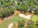 Birds-eye view of golf course with multiple sand traps and manicured green at 322 Clubview Rd, Summerville, SC 29485