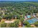 Community aerial featuring a golf course, pool, tennis courts and surrounding neighborhood at 322 Clubview Rd, Summerville, SC 29485