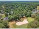 Aerial view of a neighborhood with a golf course, swimming pool and tennis courts at 322 Clubview Rd, Summerville, SC 29485