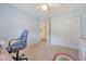 Bedroom featuring blue walls, carpet, closet, and ceiling fan at 322 Clubview Rd, Summerville, SC 29485