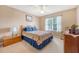 Cozy bedroom with a window and a bed featuring a colorful quilt at 322 Clubview Rd, Summerville, SC 29485