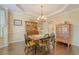 Dining room with hardwood floors, a chandelier, and traditional furniture at 322 Clubview Rd, Summerville, SC 29485