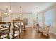 Beautiful kitchen with modern appliances, breakfast bar seating, and dining area at 322 Clubview Rd, Summerville, SC 29485