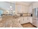 Bright, modern kitchen featuring granite countertops and stainless steel appliances at 322 Clubview Rd, Summerville, SC 29485