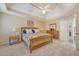 Cozy main bedroom featuring neutral walls, plush carpet, and a vaulted ceiling with a ceiling fan at 322 Clubview Rd, Summerville, SC 29485