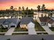 Beautiful aerial shot of homes near a serene lake, showcasing lush greenery and peaceful surroundings at 327 Tupelo Lake Dr, Summerville, SC 29486