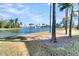 Picturesque backyard view with lakefront and trees highlighting the natural beauty and serene setting at 327 Tupelo Lake Dr, Summerville, SC 29486