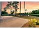 Beautiful backyard with a concrete patio that overlooks the calm lake at 327 Tupelo Lake Dr, Summerville, SC 29486